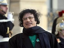 муаммар каддафи призвал к джихаду против швейцарии